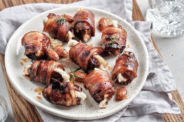 Snack plate. Bacon Wrapped Dates with Goat Cheese