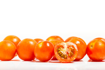 Tomato cherry isolated on white background. Macro photograpy