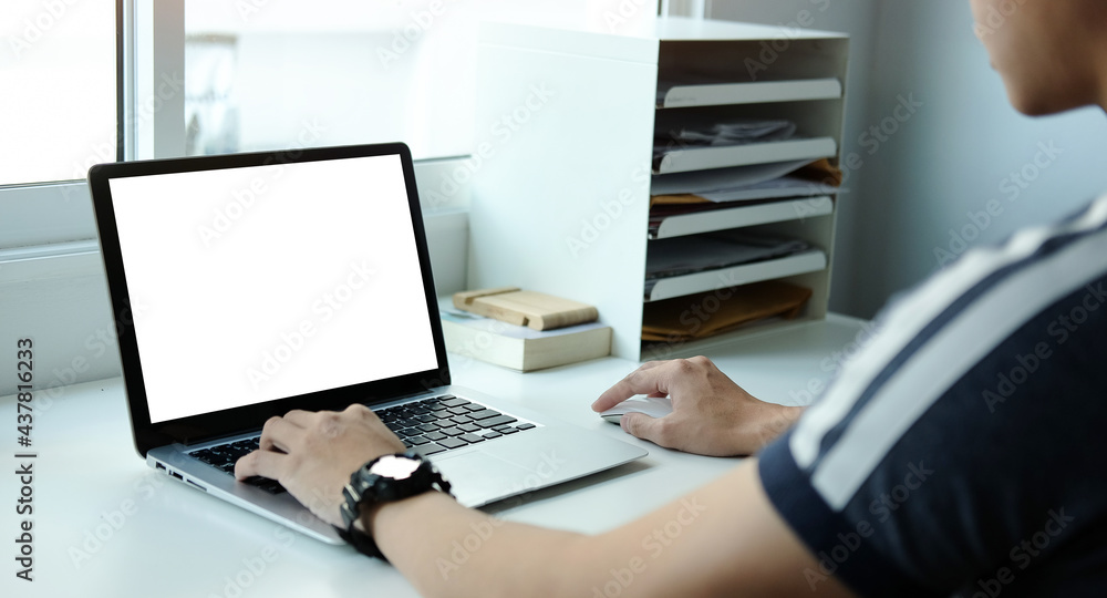 Poster mock up copy space blank screen workspace with computer laptop on table.