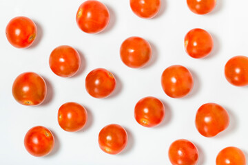 Tomato cherry pattern isolated on white background. Top view.