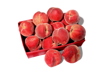 red peach fruits in a box