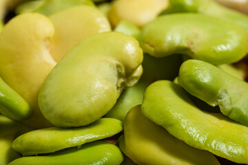 Green boiled broad beans close up. Macro photography.