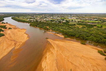 Aerial view from helicopter over Carnarvon and Gascoyne River in Western Australia. May 2021