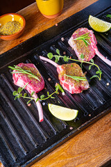 Seasoned and Herb Marinated Raw Lamb Chops