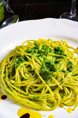 Pasta with wild garlic pesto and pine nuts