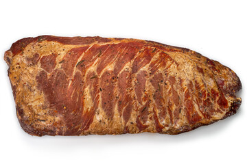 Close-up of smoked baby back pork ribs with lard isolated on a white background