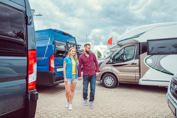 Couple facing abundance of choice in camper vans to buy - 437826205
