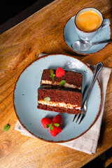 Rustic chocolate cake with raspberries and coffee