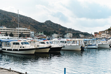 Fototapeta na wymiar Many sailing boats parked in a harbor
