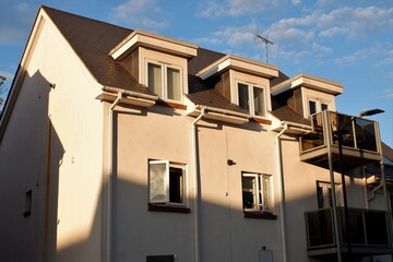 Modern apartment building in evening sunlight