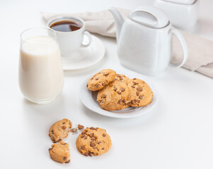 biscuits on plate, coffee and milk