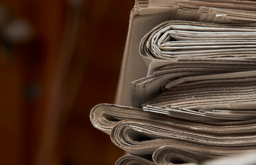 Stack of newspaper, close-up. Journalism concept