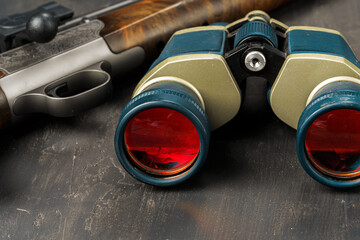 Hunting binoculars with red lense, close up