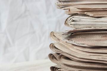 Stack of newspaper, close-up. Journalism concept