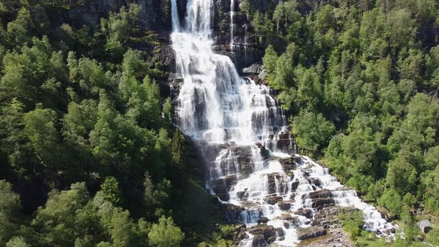 Famous Tvindefossen aerial approaching with view from top to bottom - Voss Norway