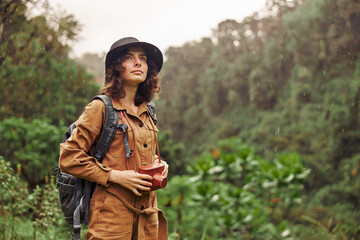 Beautiful young female caucasian tourist in equatorial africa jungles