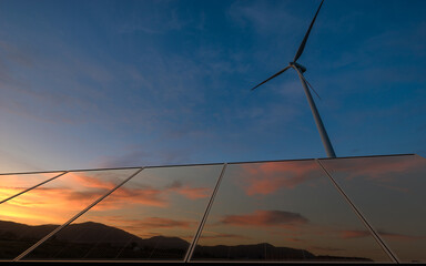 Beautiful sky at sunrise reflecting in photovoltaic panels