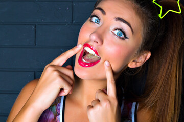 Studio fashion portrait of sexy hipster woman