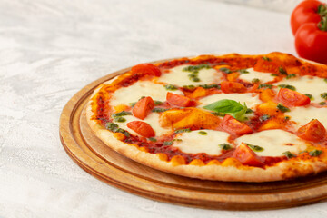 Freshly baked pizza on table close up