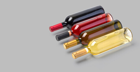 Wine bottles on grey background