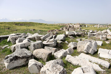 Fototapeta na wymiar stone and marble debris on archaeological site Laodicea on the Lycus in Turkey 