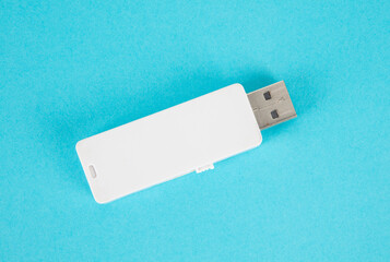 USB flash drive on blue background