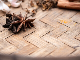 Top view of colourful spices in wooden tray. Asian popular cooking ingredients, dry hot healthy cook herbs. view form above and copy space background.
