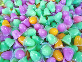 Fototapeta na wymiar Colorful jelly in a cup, children snack