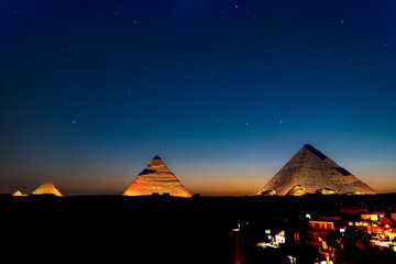 Fototapeta na wymiar The Giza Pyramids lit up at Night