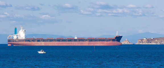 Empty container freighter ship waiting on Vladivostok, Russia