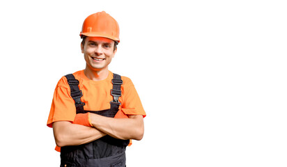 Young happy laughing man builder construction worker is looking at the camera on white background