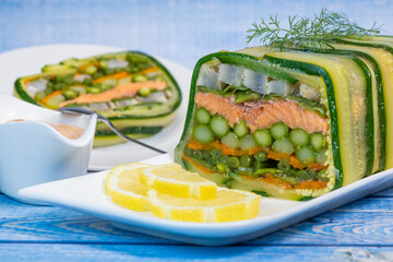 Recipe of marbled vegetables, salmon and langoustines, terrine salmon vegetables and langoustines. High quality photo