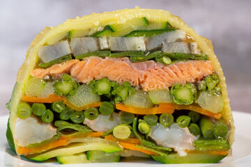 Recipe of marbled vegetables, salmon and langoustines, terrine salmon vegetables and langoustines....