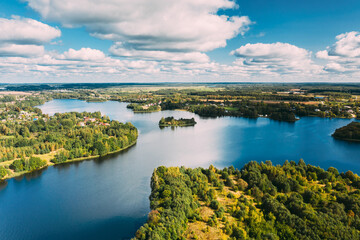 Lyepyel District, Vitebsk Region, Belarus. Aerial View Of Lyepyel Cityscape Skyline In Summer Day. Sunny Sky Above Lepel Lake. Top View Of European Nature From High Attitude In Summer. Bird's Eye View