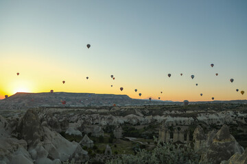 
dawn with balloons in the sky