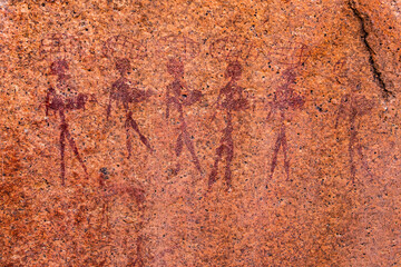 Old rock painting of the San people in a granite rock wall  in the Erongo mountains, Namibia
