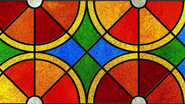 Colored stained glass window. Oranges. Citrus slices. Fruit. Bright colors, colorful. Modern stained glass. Abstract stained-glass background. Architectural decor. Design interior.
