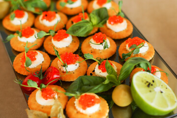 cracker and red caviar
