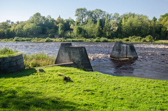 Concrete icebreakers in Memele river, Bauska, Latvia.