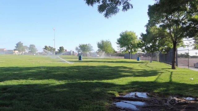 Sprinklers and water in the park
