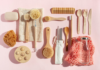 zero waste eco friendly cleaning kitchen bathroom concept. wooden brushes, drinking straw, cotton bags