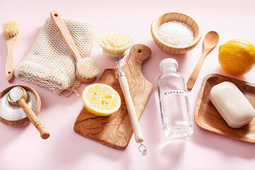 zero waste eco friendly cleaning concept. wooden brushes, lemon, baking soda, vinegar