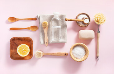 zero waste eco friendly cleaning concept. wooden brushes, lemon, baking soda, vinegar