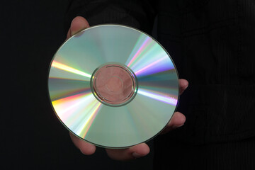 CD or DVD. Black Background.