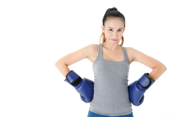 Excited sportswoman in boxing gloves celebrating victory