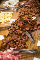 Sliced sausages and cheese