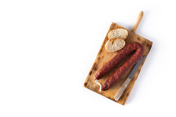 Spanish chorizo sausage isolated on white background. Top view. Copy space