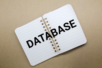 open notebook with the word Database