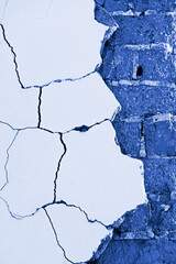 Wall Texture - Perfect Grunge Background With Space For Text. The image is tinted in the color of the year-classic blue.