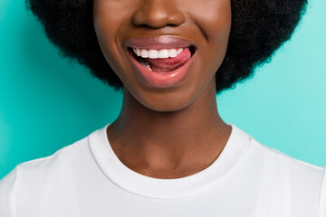 Cropped photo of lovely short hairdo brunette millennial lady lick teeth wear white t-shirt...